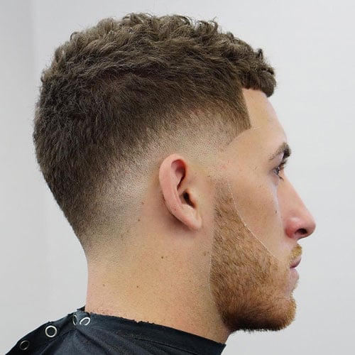 Man with a low Caesar haircut