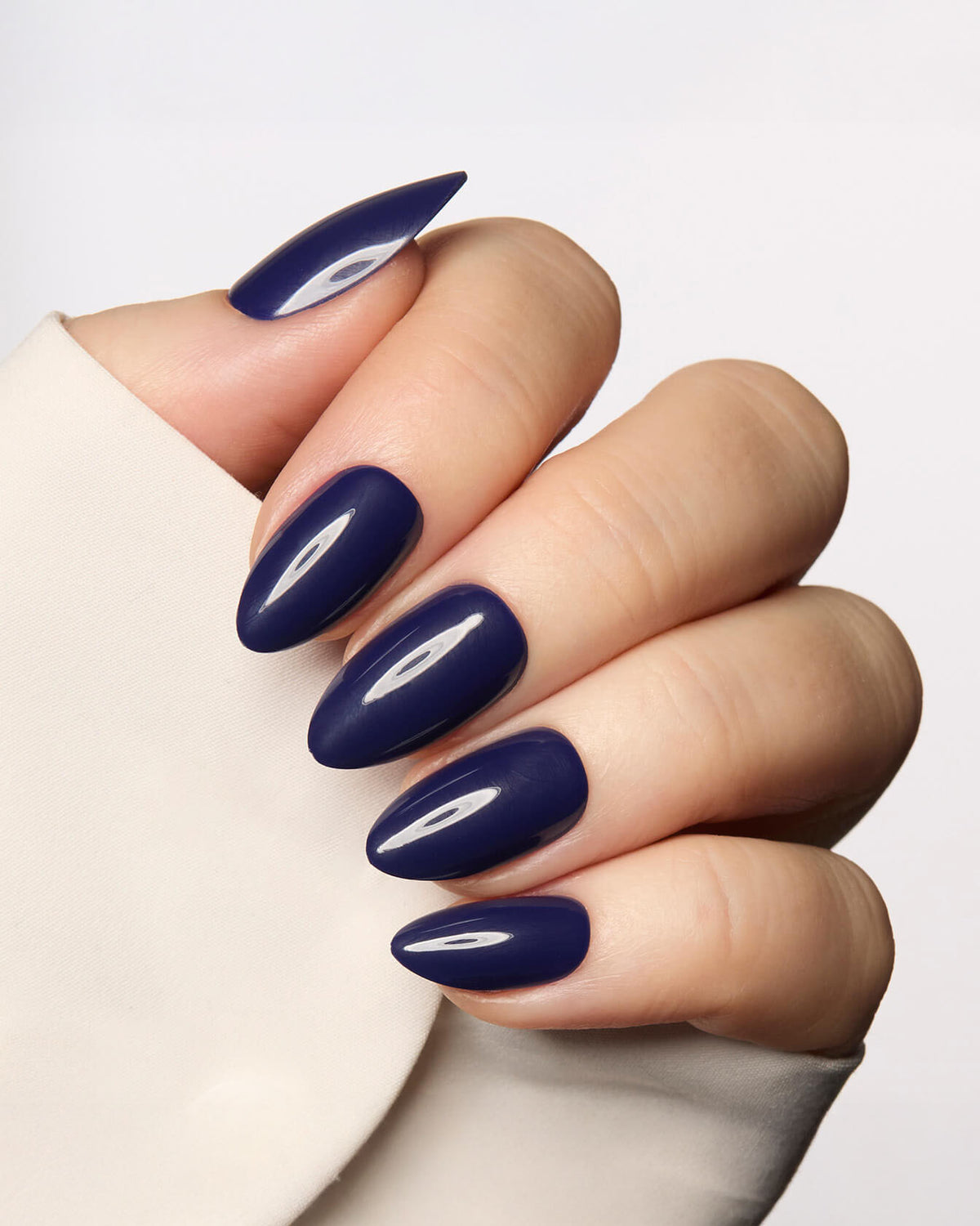 Long almond nails in deep navy gloss