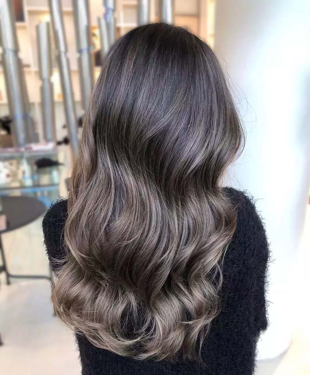 Long wavy hair in mushroom ash brown color