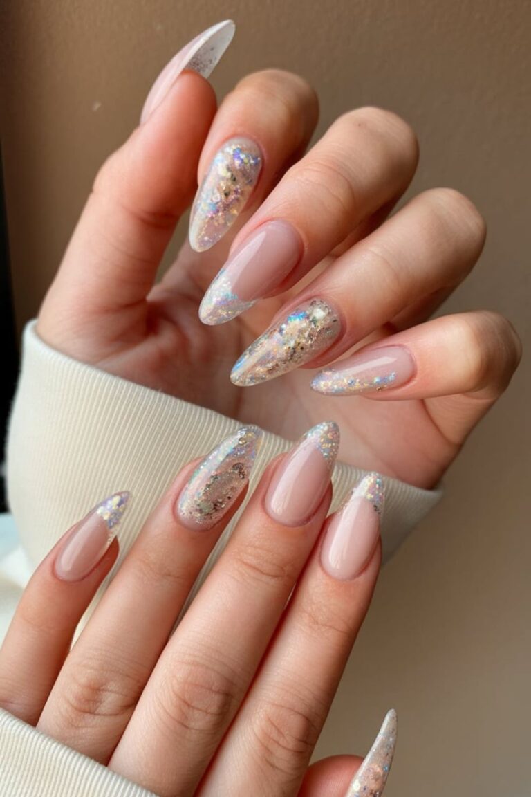 Almond nude nails with clear glitter tips
