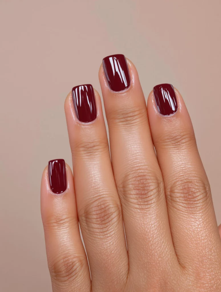 Short square nails in rich oxblood glossy polish