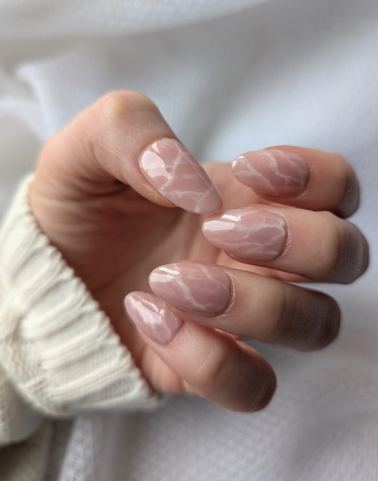 Almond nails with blush pink marble and white veining