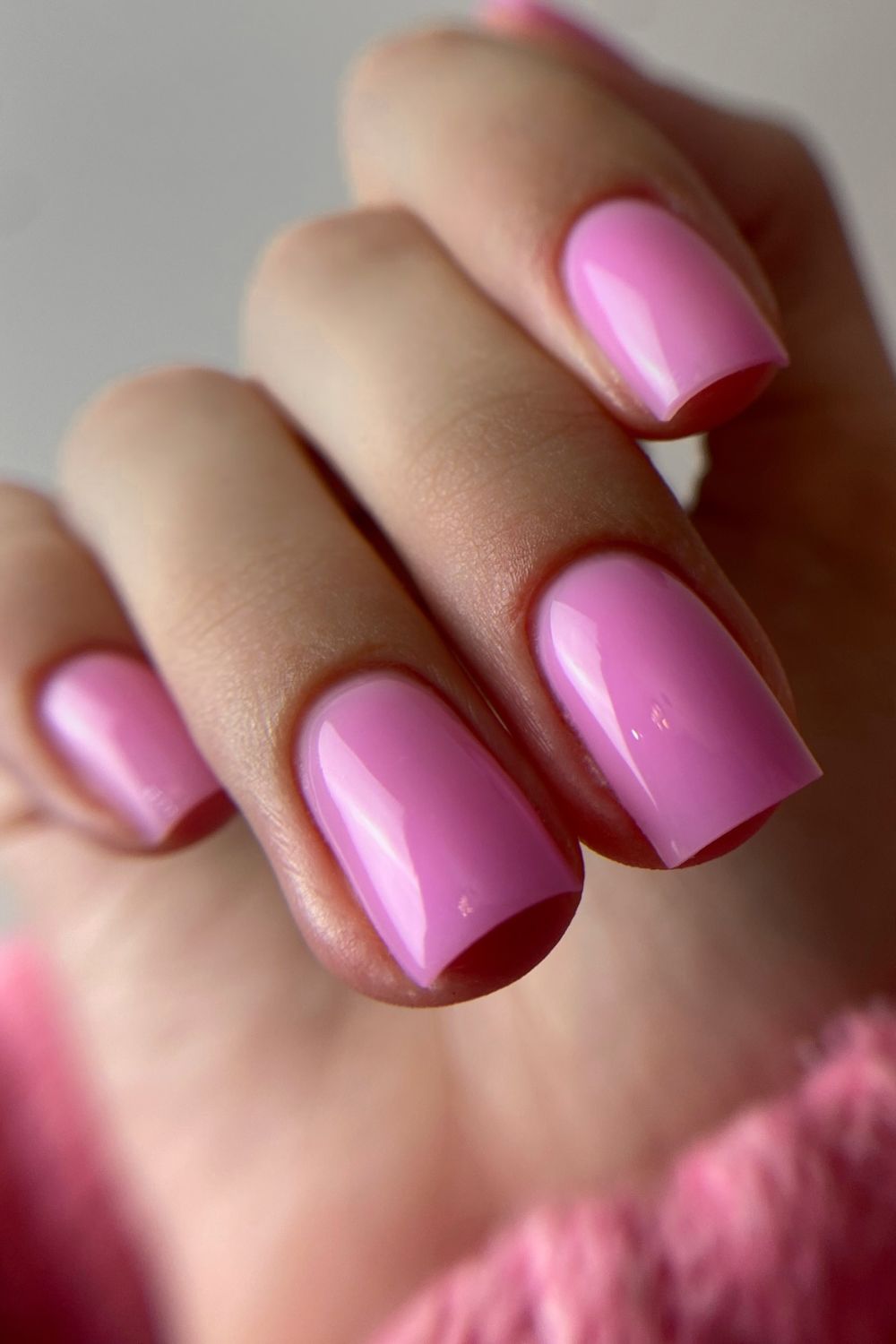 Glossy bubblegum pink manicure
