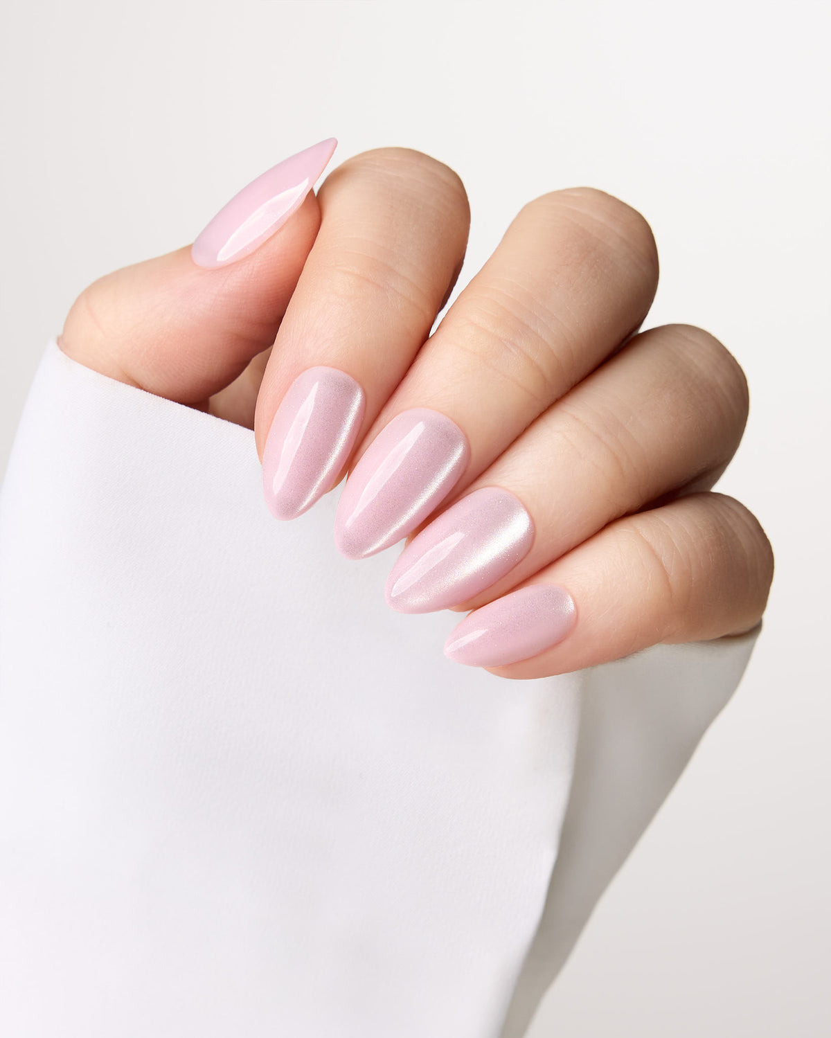 Pale pink cat eye almond press-on nails