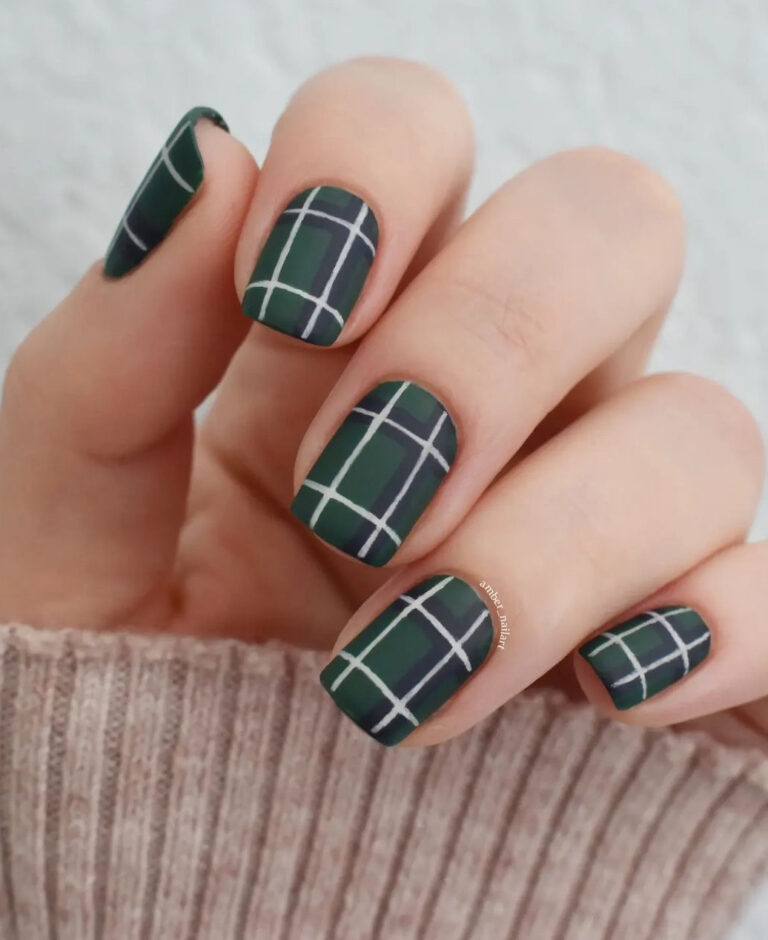 Forest green plaid nail art on medium length nails