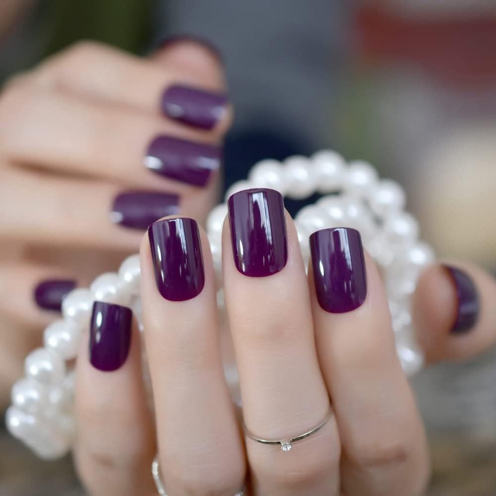 Deep plum matte manicure