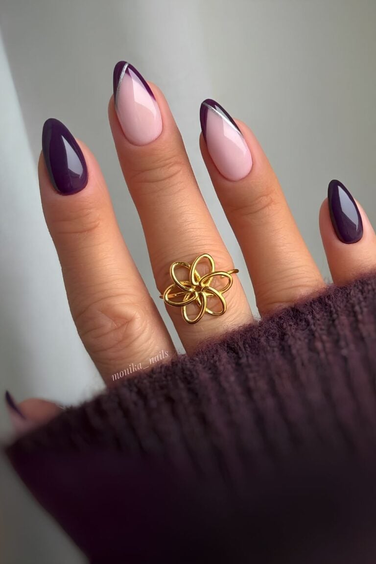 Deep plum oval nails with fine silver line art