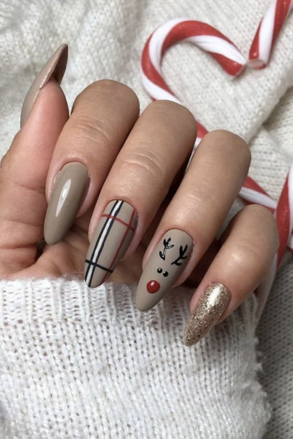 Red and cream plaid nail art on almond accent nails
