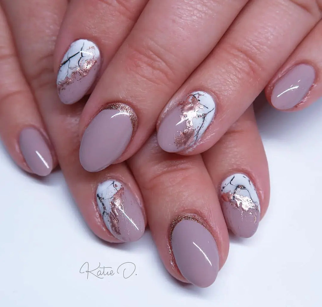 Dusty rose nails with rose gold foil accents