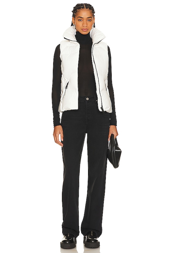 White puffer vest styled for winter