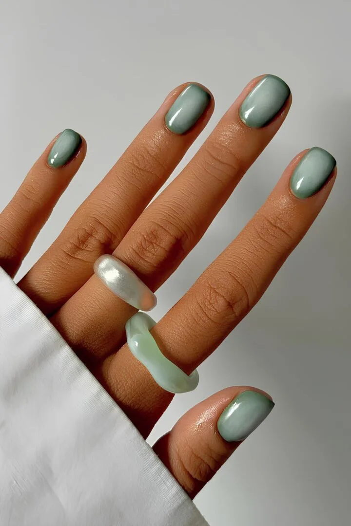 Sage Serenity: a muted green aura breathing over milky white