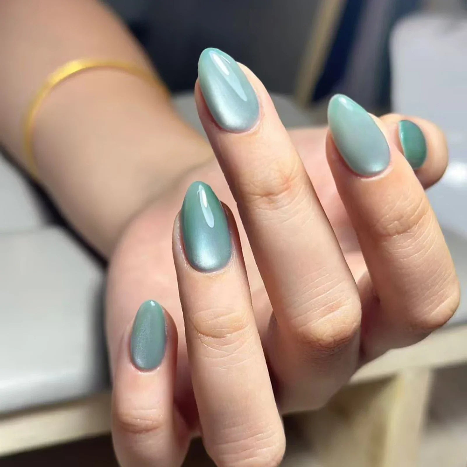 Frosted mint green cat eye nails