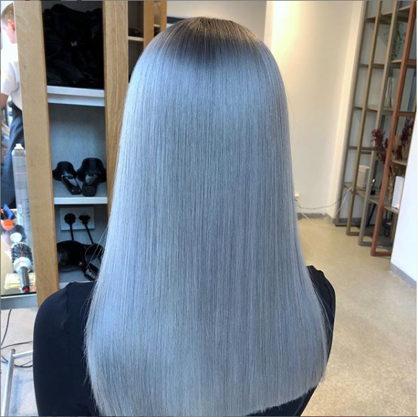 Very long straight icy silver-gray hair from the back