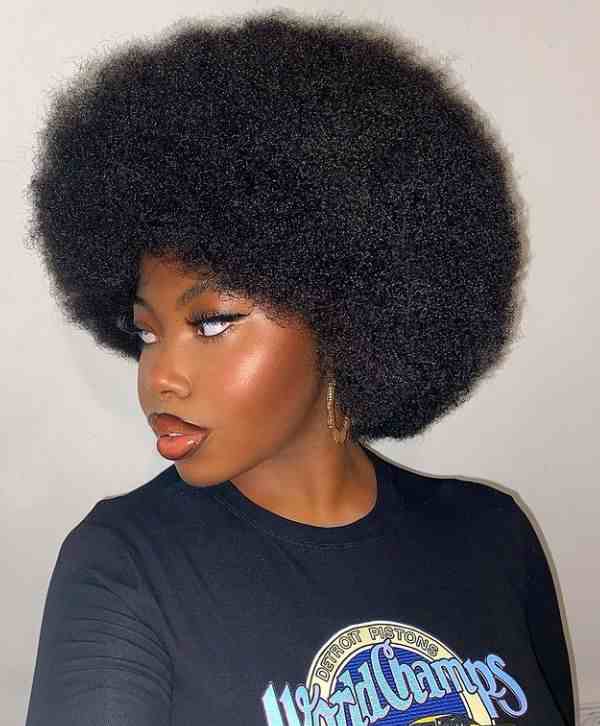 Large rounded afro picked out for maximum volume