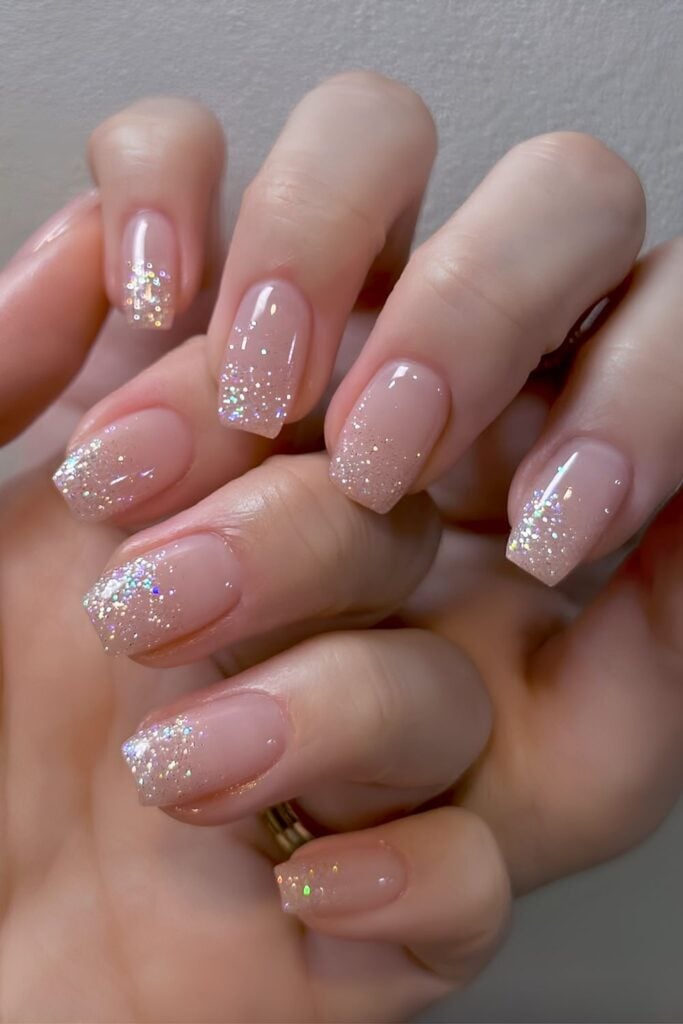 Sheer nails with holographic glitter ombre