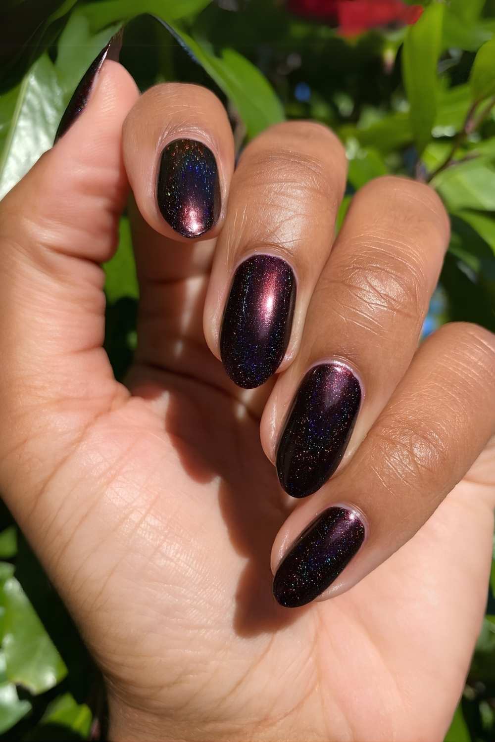 Black cherry sparkle gel nails in a deep wine shade