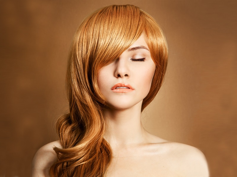Copper red side-swept waves on a bride