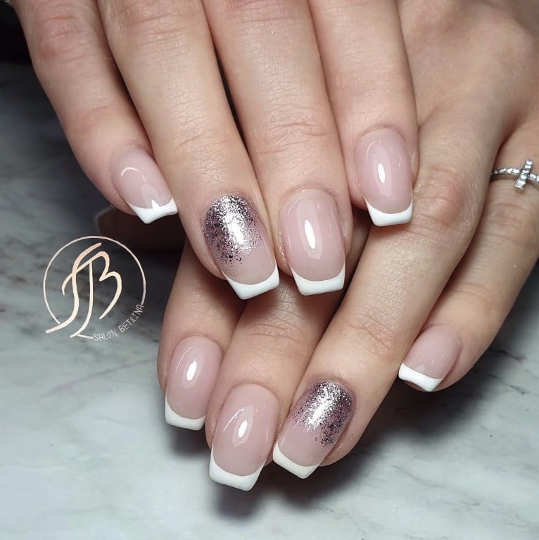 Silver Glitter Fade: sheer base melting into dense silver glitter at the tips