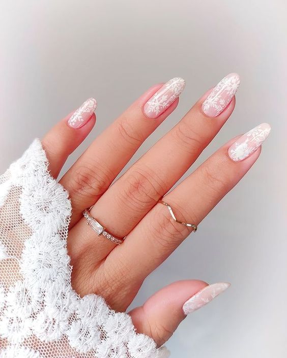 Almond nails in frosty sheer white winter polish