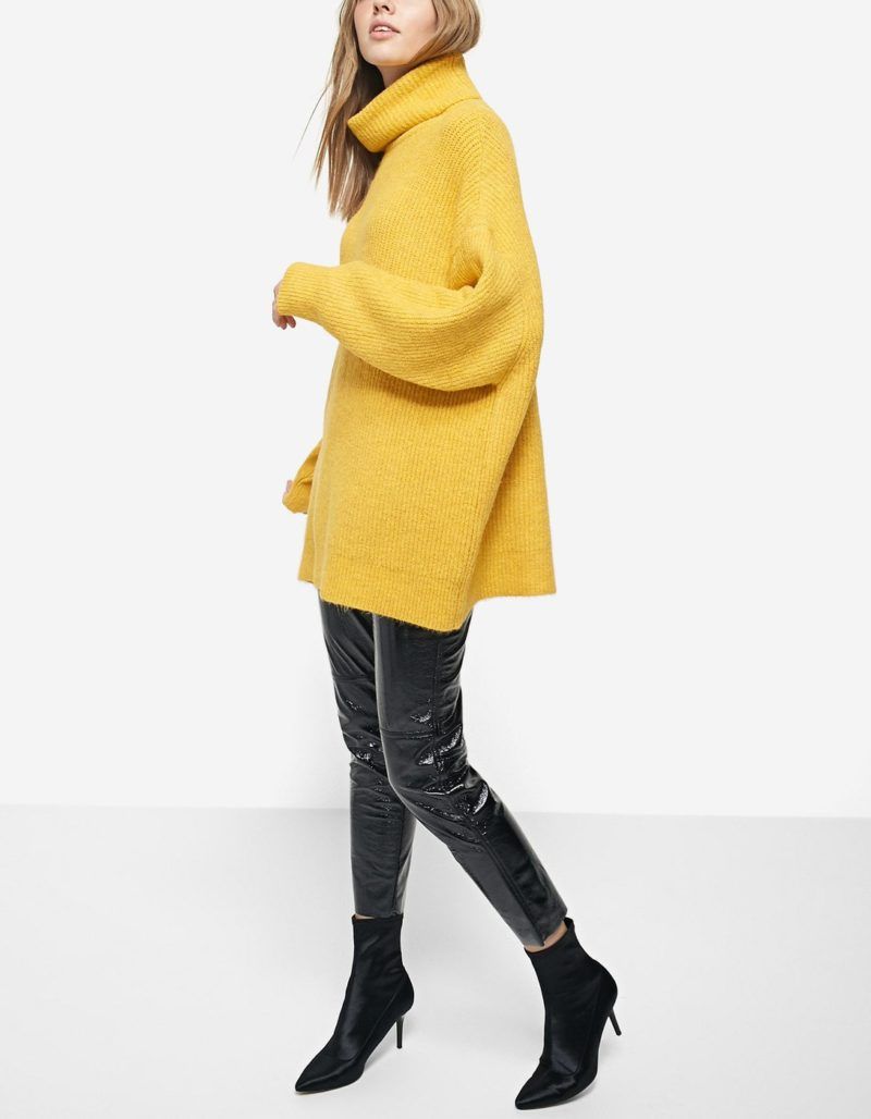 Mustard oversized sweater styled with dark denim