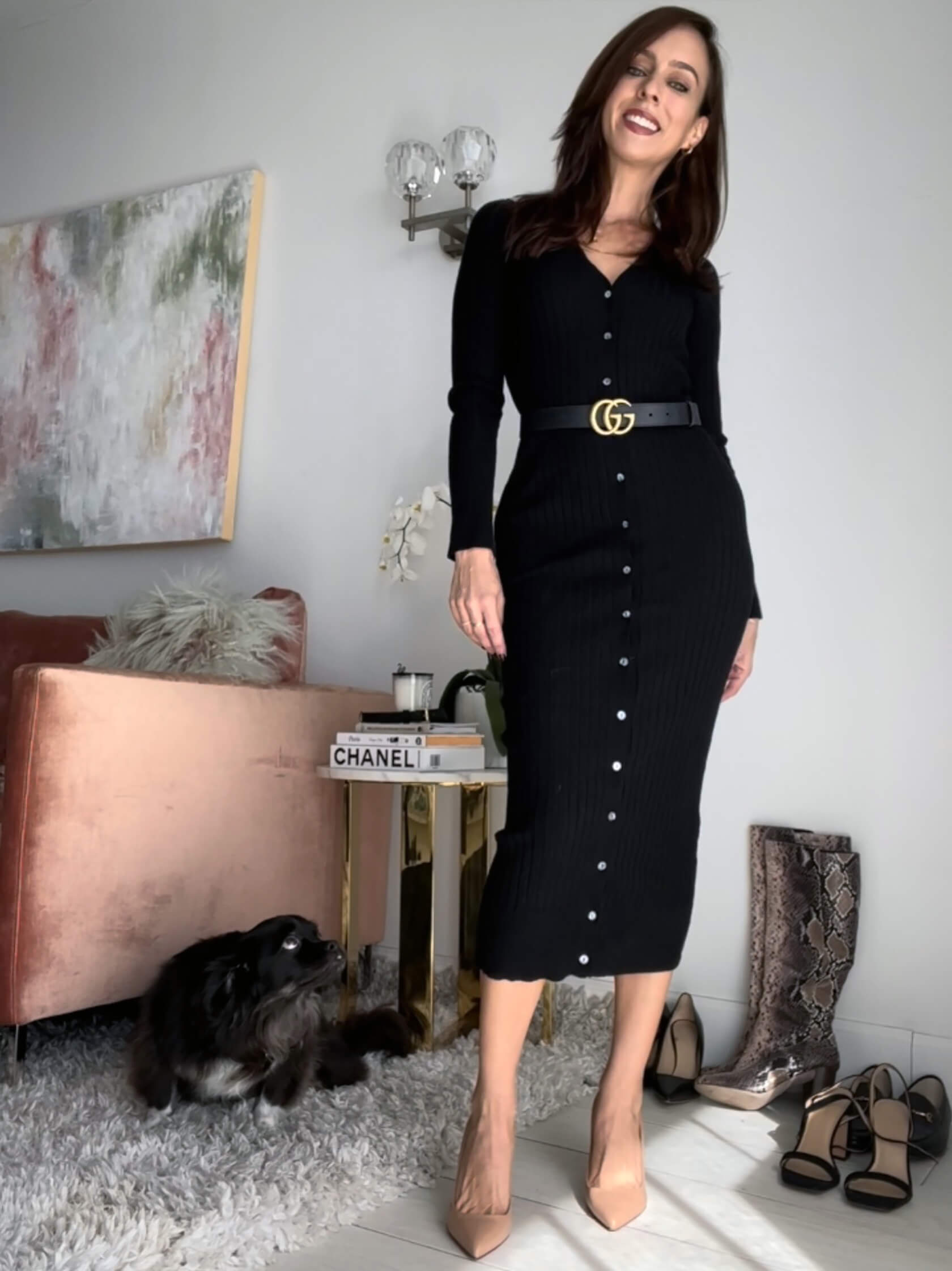 Black ribbed-knit button-front cardigan sweater dress cinched with a black logo belt and nude pointed pumps