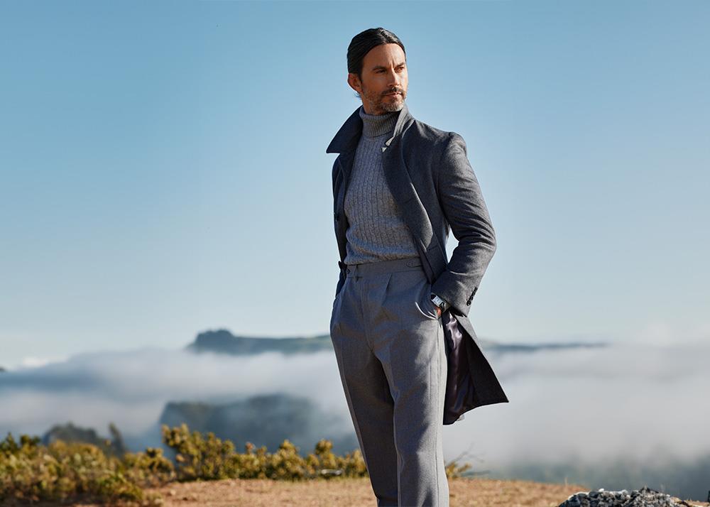Man wearing a tailored winter coat in a smart casual outfit