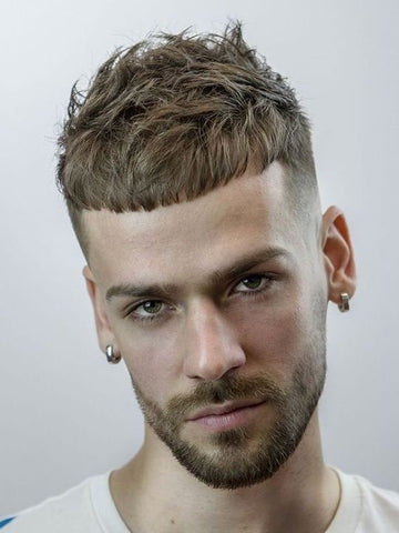 Man with a textured Caesar haircut