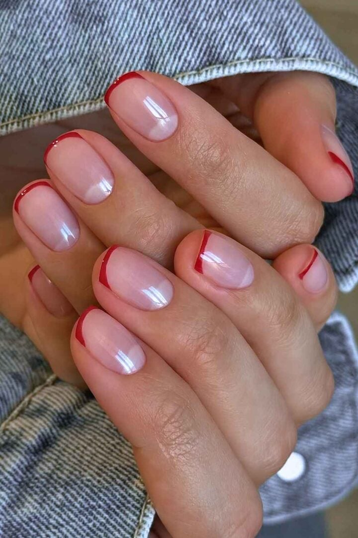 Pink manicure with thin red micro French tips