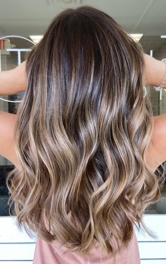 Caramel bronde balayage with honey dimension on long hair