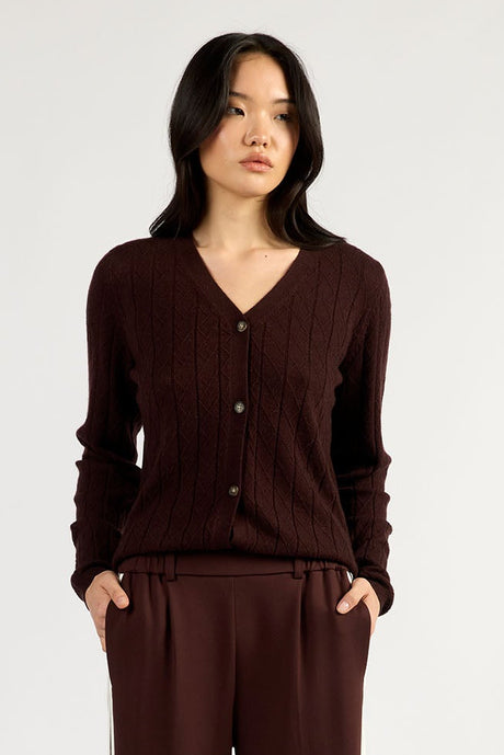 Chocolate brown knit cardigan layered over a slip dress