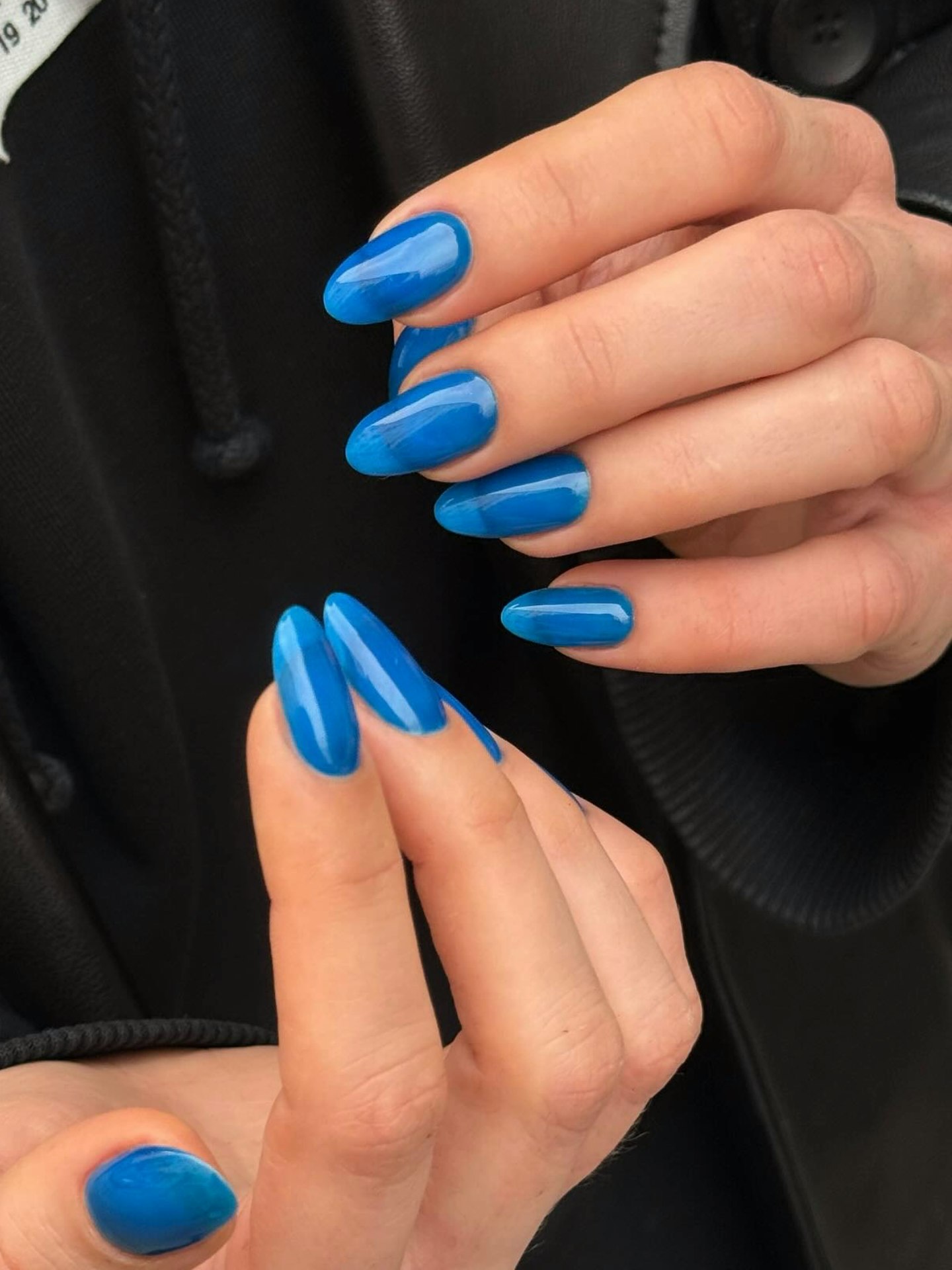Almond nails in sheer baby blue jelly polish