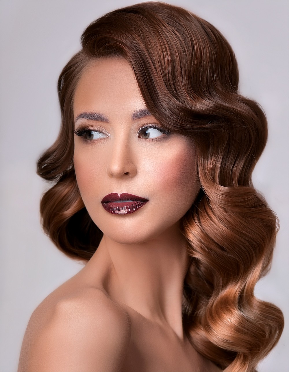 Classic vintage Hollywood waves with deep side part for formal wear