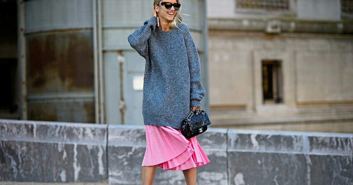 Oversized sweater paired with a flowing midi skirt