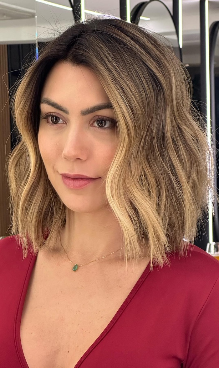 Honey bronde wavy lob with soft face-framing layers