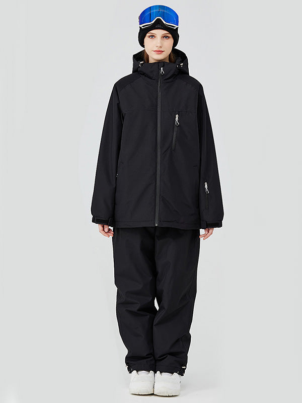 Woman in a hooded two-piece snowsuit set in an icy blue print
