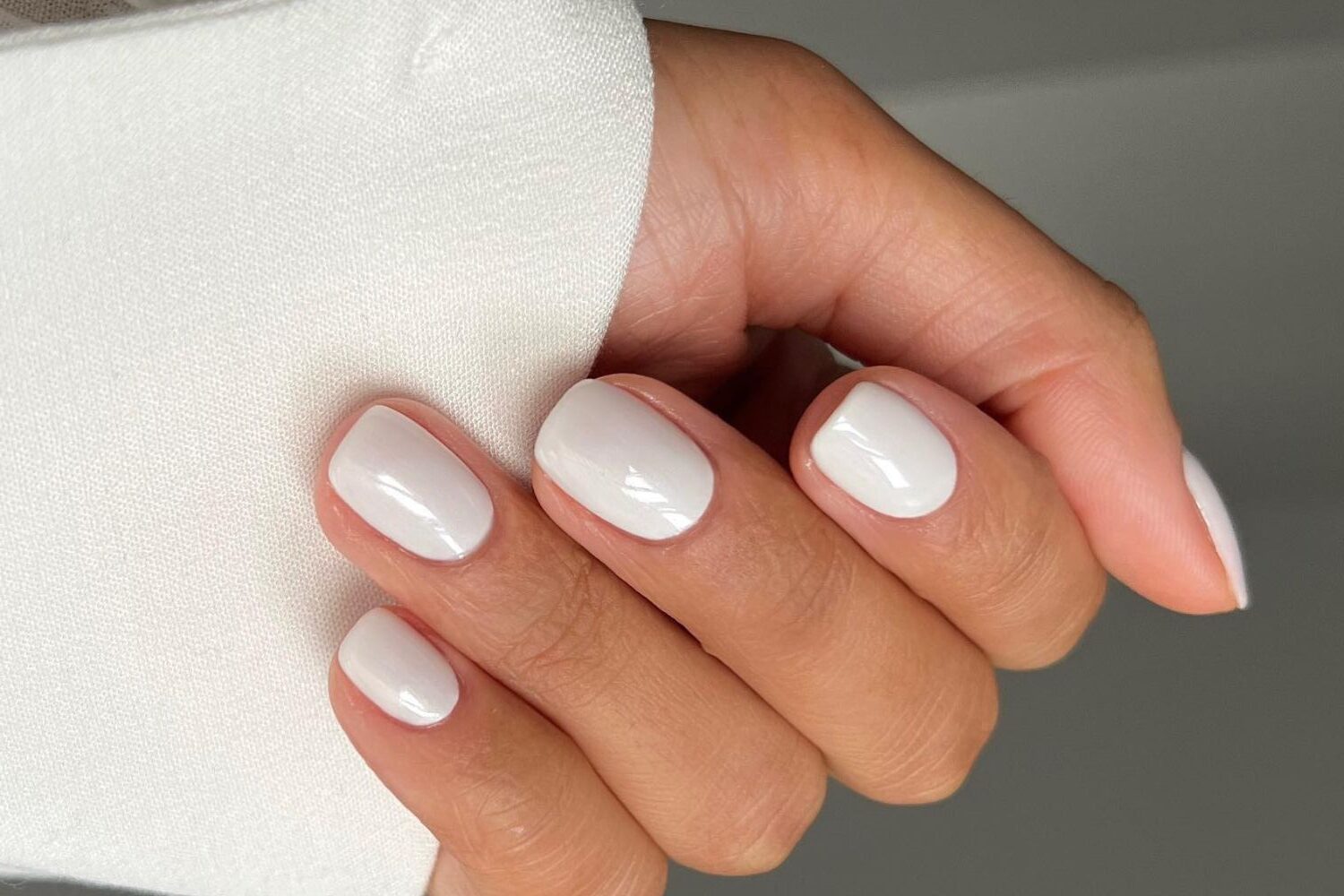 Glossy opaque white nails