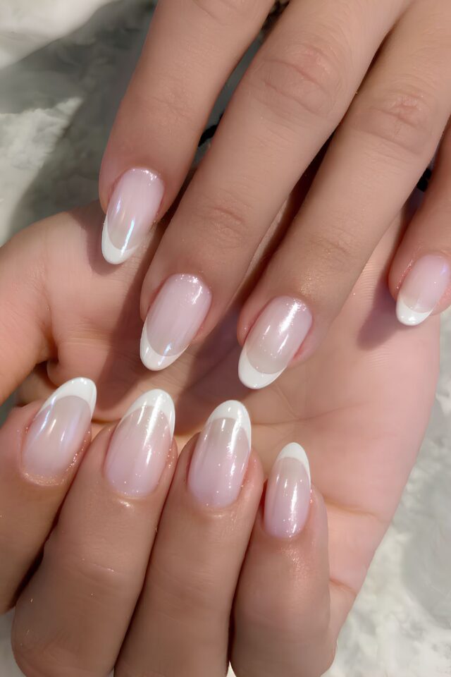 Milky white French nails with iridescent chrome tips