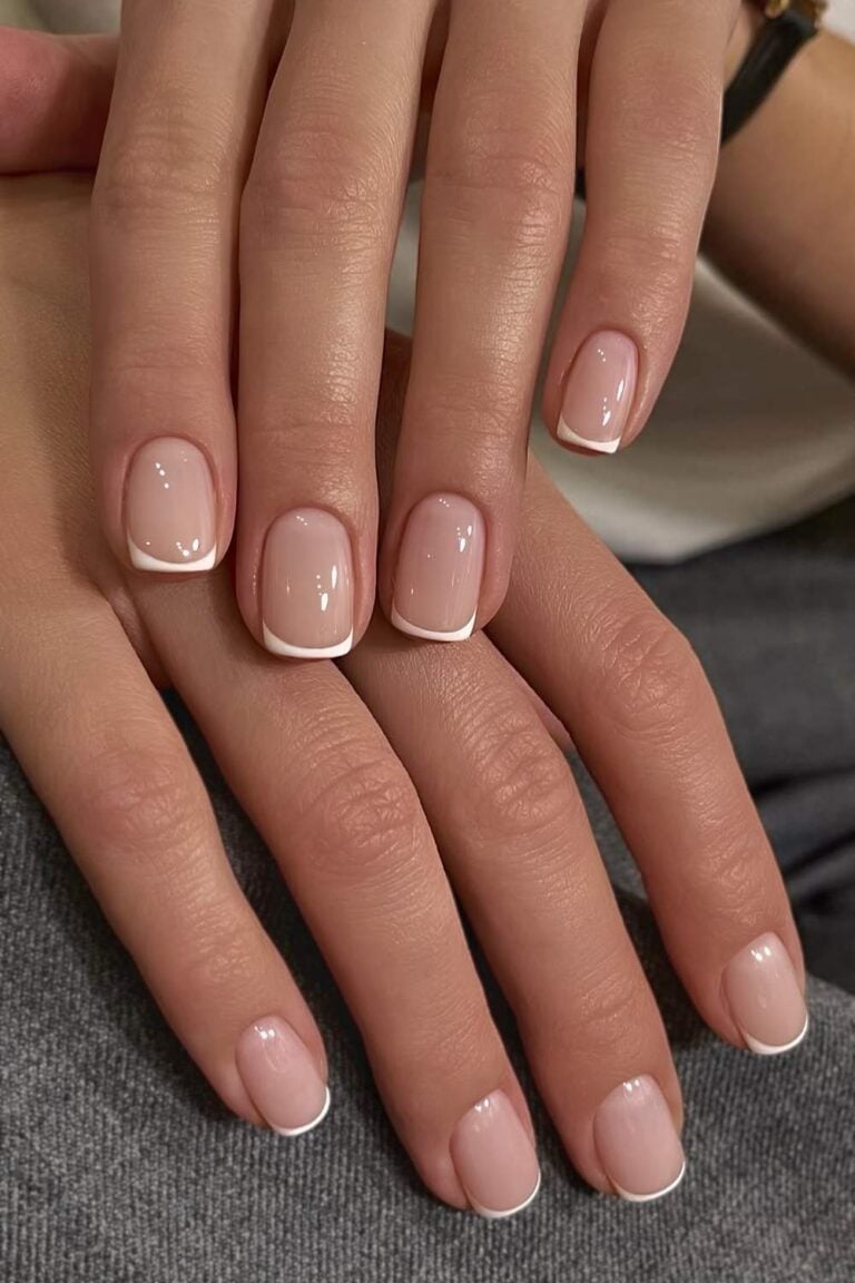Short square nude nails with thin white micro-French tips
