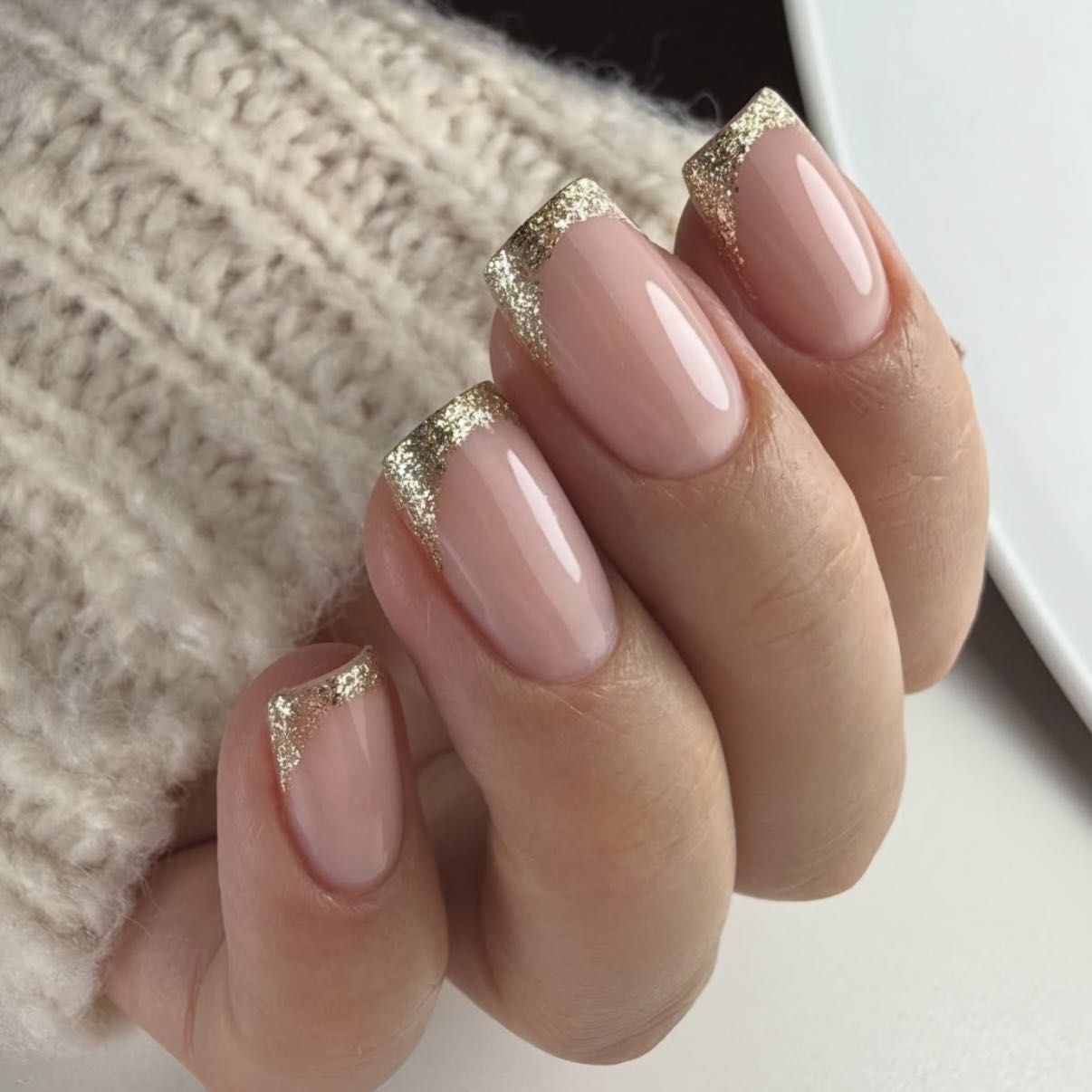 Square nude nails with gold glitter French tips
