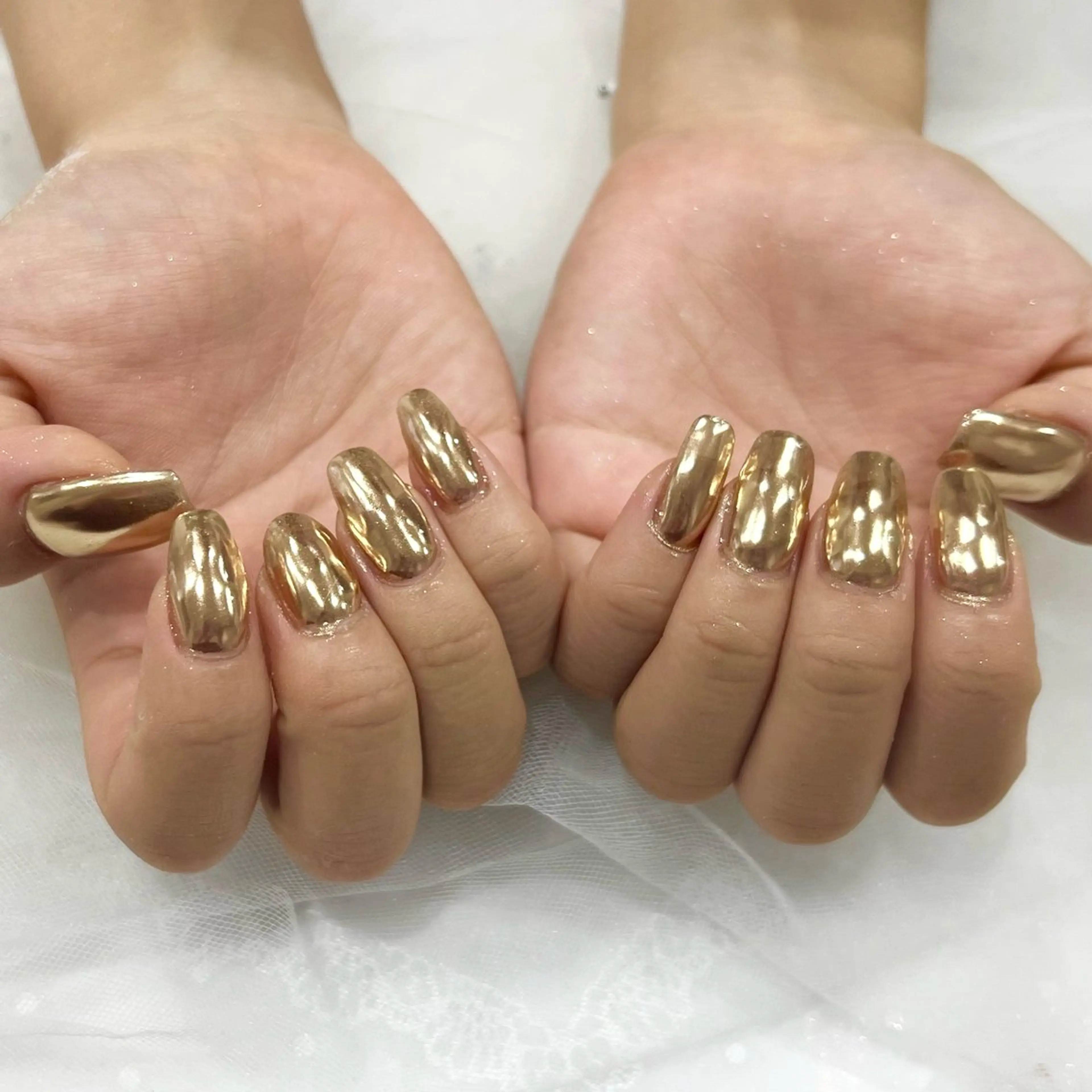 Short square nails with mirror metallic gold chrome finish