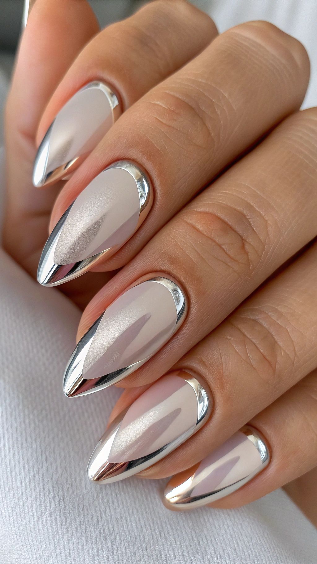 Silver chrome french tips on almond nails