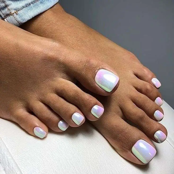 Pedicure with iridescent pearl chrome finish shifting pink, green and lavender