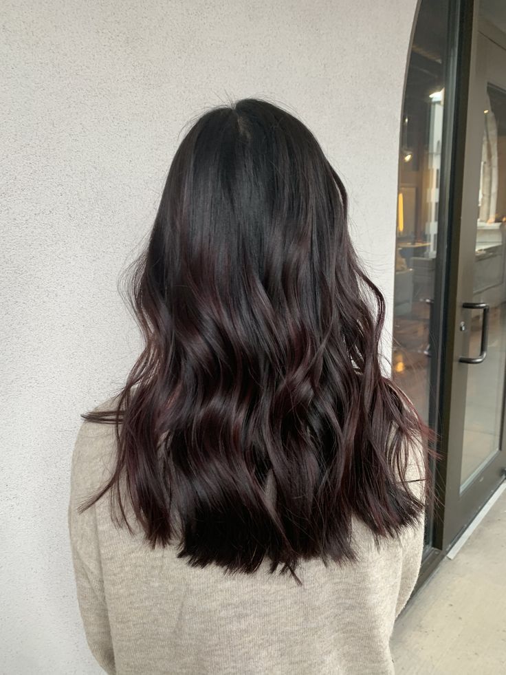 Black cherry hair color with dark red undertones