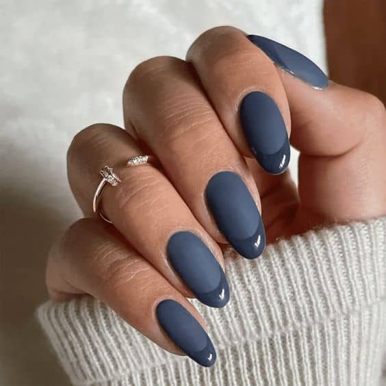 Dusty blue matte nails with glossy French tips