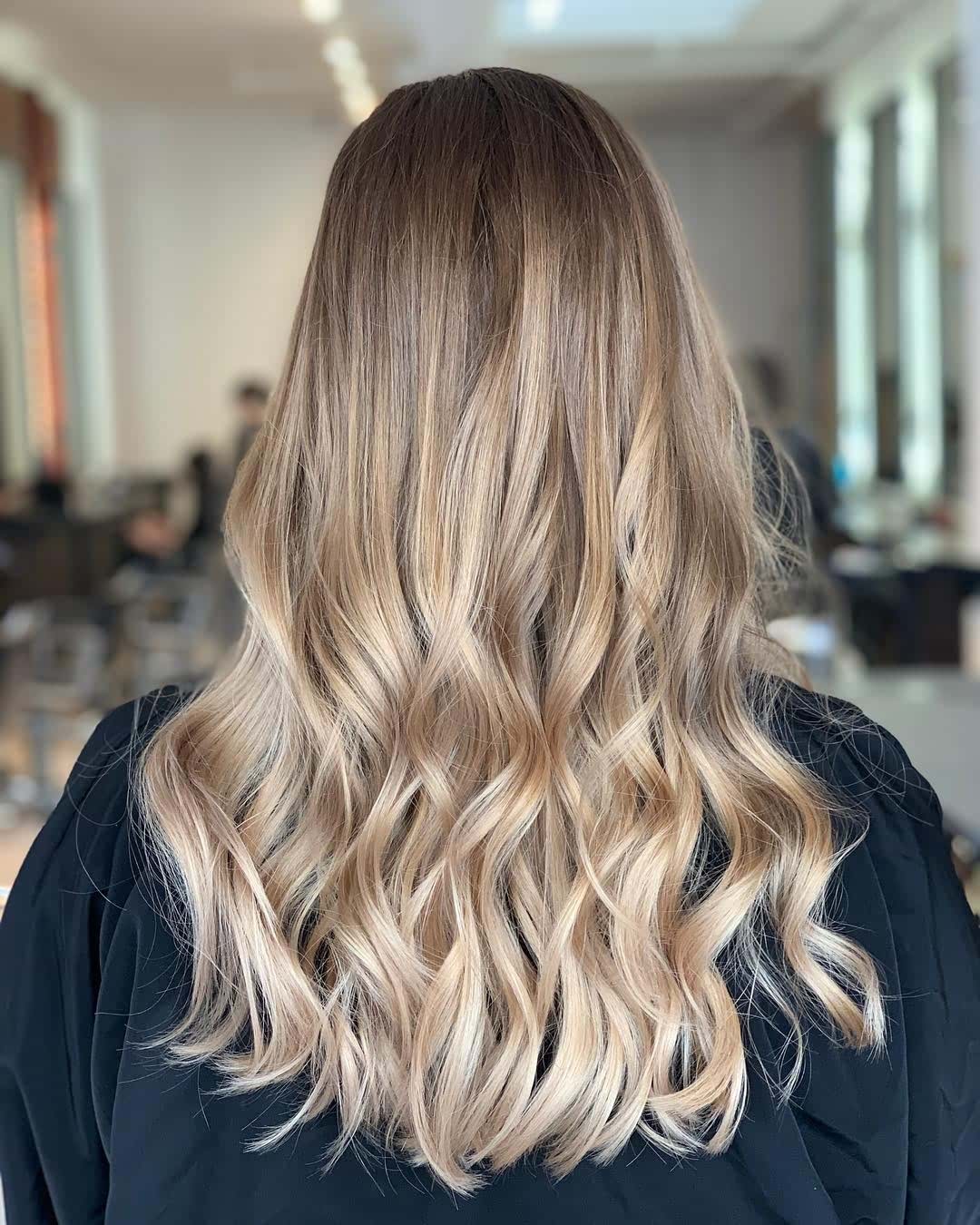 Long beachy waves with center part