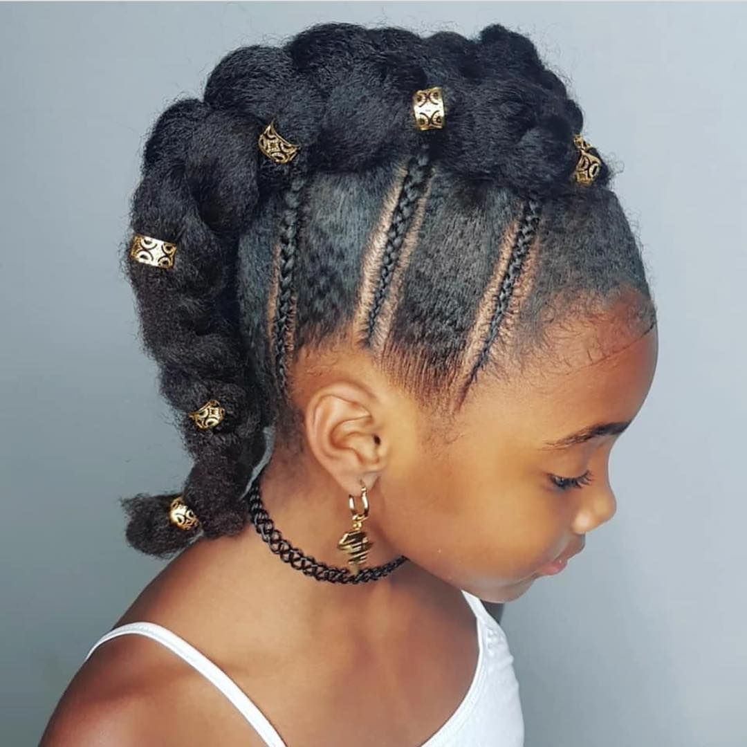 Chunky side braid decorated with gold hair cuffs