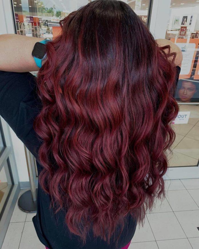 Long black cherry red hair with glossy waves, back view