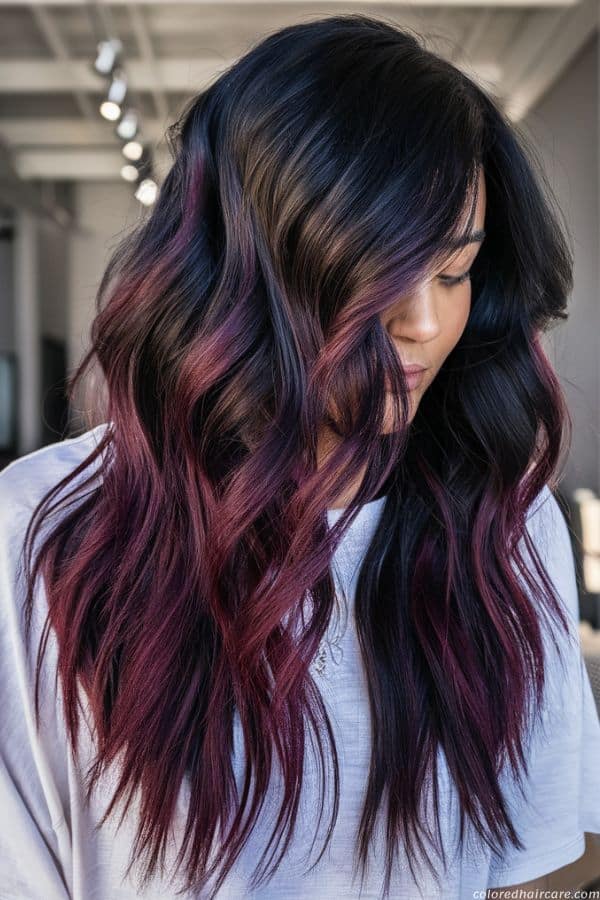 Mahogany red highlights woven through long black hair