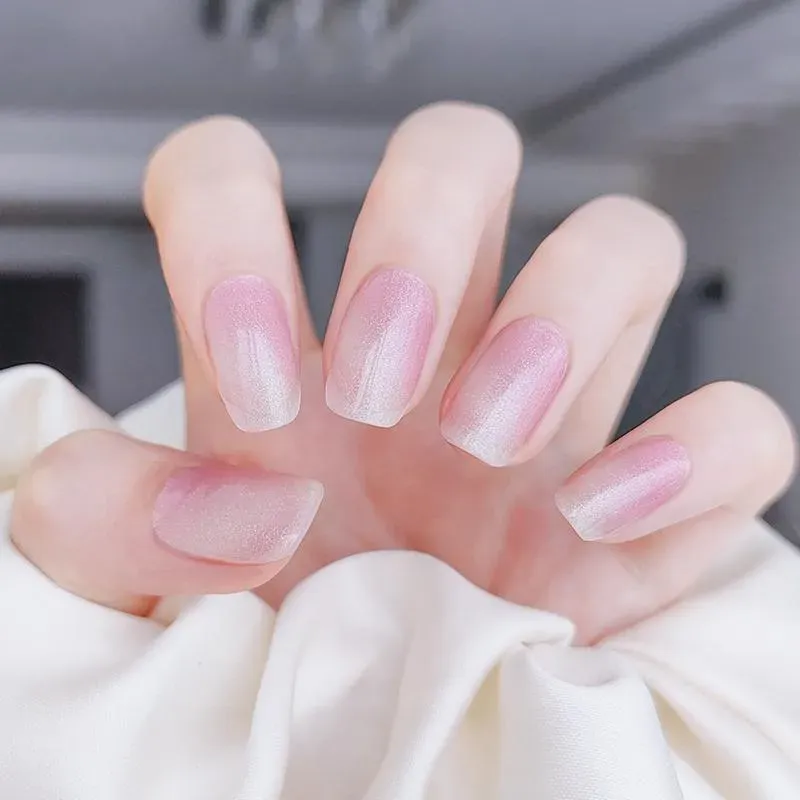 Short nails with blush pink shimmer gel polish