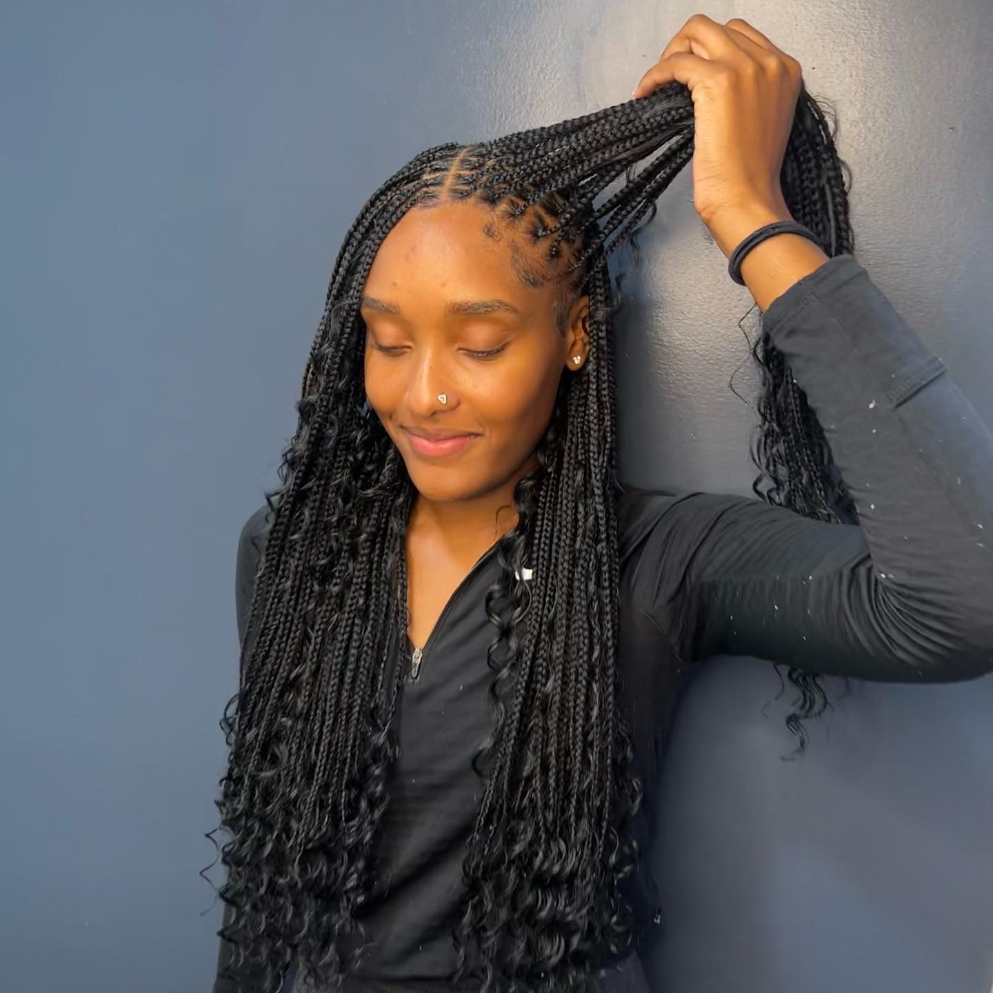 Boho knotless braids with loose curly ends